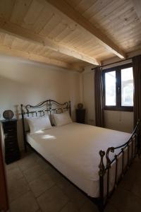 a bedroom with a large bed in a room at 5 Stars Villas in Svoronata +63 photos