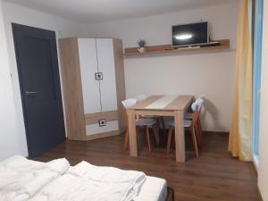 Postel nebo postele na pokoji v ubytování Mátrai5Vendégház