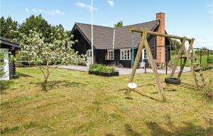 Κήπος έξω από το Holiday Home Knebel With Sauna I