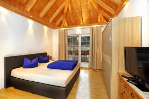 Postel nebo postele na pokoji v ubytování Hotel Stecher