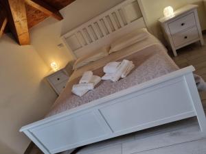 Postel nebo postele na pokoji v ubytování B&B da Mary