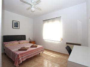 Posteľ alebo postele v izbe v ubytovaní Casa Yvette