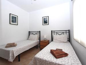 Posteľ alebo postele v izbe v ubytovaní Casa Yvette