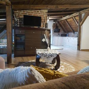 Μια τηλεόραση ή/και κέντρο ψυχαγωγίας στο Apartament wiejska chata 150m2 +41 φωτογραφίες