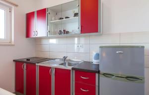 Kuchyň nebo kuchyňský kout v ubytování Apartments Ana