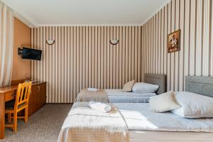 Postel nebo postele na pokoji v ubytování Zajazd Żuławy - Restauracja & Hotel