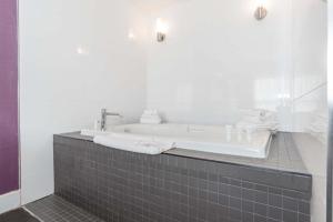 Kúpeľňa v ubytovaní Sandman Signature Kamloops Hotel