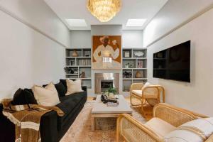Μια τηλεόραση ή/και κέντρο ψυχαγωγίας στο Luna Residence at Sydney Harbour