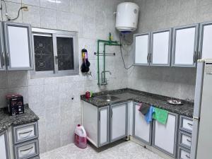 Kuchyň nebo kuchyňský kout v ubytování Kings Business Suite