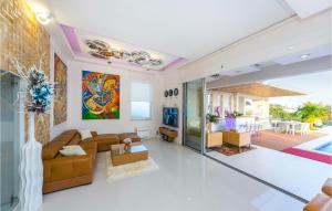 a living room with a couch and a table at Villa Petra Pag in Borovići