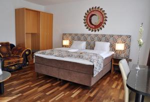 Postel nebo postele na pokoji v ubytování Hotel Torwirt