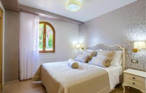 Postel nebo postele na pokoji v ubytování Villa Mustra