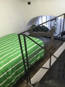 A bed or beds in a room at Appartamento al Ponte Reale