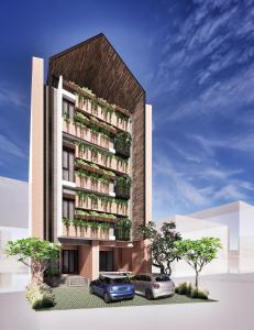 a rendering of a building with cars parked in front at Althia Capsule Quarters in Badung