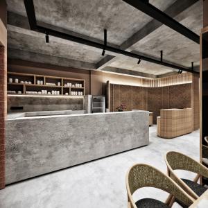 a lobby of a restaurant with a concrete counter and chairs at Althia Capsule Quarters in Badung