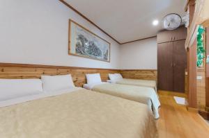 Letto o letti in una camera di Donglifang B&B
