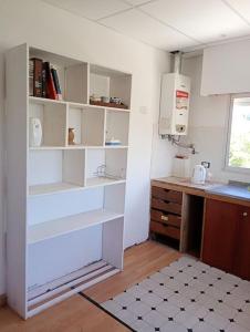 Η κουζίνα ή μικρή κουζίνα στο Amplio departamento céntrico