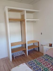 Ένα ή περισσότερα κρεβάτια σε δωμάτιο στο Amplio departamento céntrico +2 φωτογραφίες