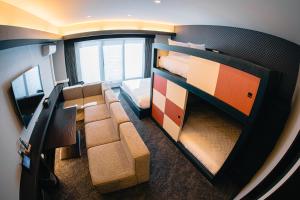 GOLD STAY Nagoya Sakae ゴールドステイ名古屋栄 にあるテレビまたはエンターテインメントセンター