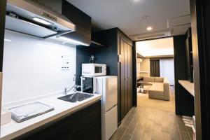 GOLD STAY Nagoya Sakae ゴールドステイ名古屋栄 にあるキッチンまたは簡易キッチン