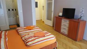 מיטה או מיטות בחדר ב-Boomerang Hostel