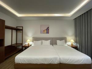 Postel nebo postele na pokoji v ubytování Field Villa Hoàng Diệu