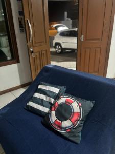Cama ou camas em um quarto em Apto térreo #3- Moradas do Pier- 2 quartos, 1 banheiro a passos da areia