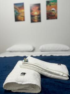 Cama ou camas em um quarto em Apto térreo #3- Moradas do Pier- 2 quartos, 1 banheiro a passos da areia