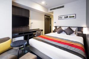 Postel nebo postele na pokoji v ubytování Hotel Mystays Premier Akasaka