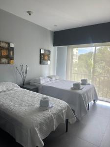 Postel nebo postele na pokoji v ubytování Casa blue