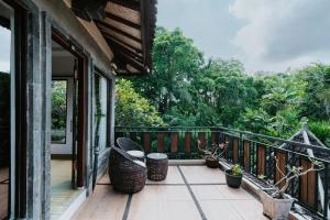 Dewangga Ubud的阳台或露台