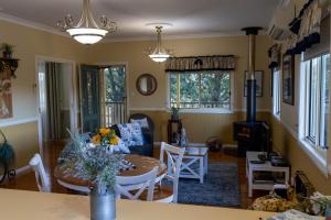 a living room with a couch and a table at Milford Country Cottages in Milford