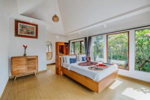 Dewangga Ubud客房内的一张或多张床位