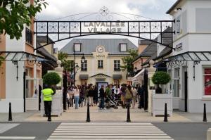 a group of people walking down a city street at Studio Disneyland Paris - Terrasse in Montévrain