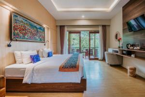 Dewangga Ubud客房内的一张或多张床位
