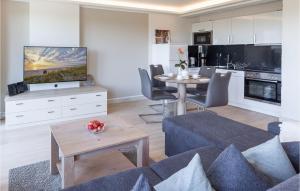 a living room with a couch and a table at Prince in Binz