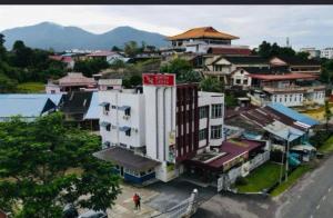 an overhead view of a city with a building at First Star Homestay - Self Check In in Kluang