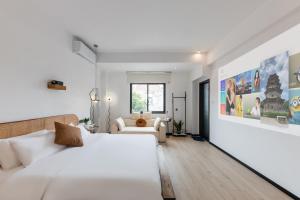 Ένα ή περισσότερα κρεβάτια σε δωμάτιο στο Quanzhou West Street Kaiyuan Temple Bandiao Inn