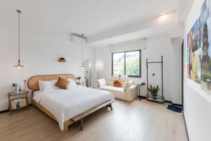 Ένα ή περισσότερα κρεβάτια σε δωμάτιο στο Quanzhou West Street Kaiyuan Temple Bandiao Inn