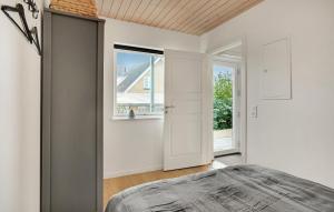 Ένα ή περισσότερα κρεβάτια σε δωμάτιο στο 3 Bedroom Lovely Apartment In Slagelse
