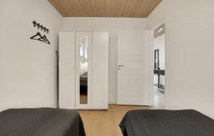 Ένα ή περισσότερα κρεβάτια σε δωμάτιο στο 3 Bedroom Lovely Apartment In Slagelse