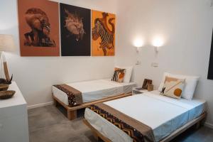Postel nebo postele na pokoji v ubytování The Oasis Residence + 37 fotografií