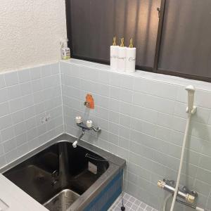 Bilik mandi di 独栋日式别墅巴士直达迪斯尼
