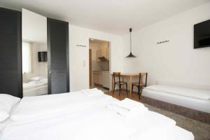 A bed or beds in a room at Appartements Christophorus