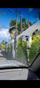 a view from the inside of a car windshield of a street at Cheerful 1 bed vacation home with tours & facilities in La Gaulette