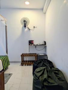 Postel nebo postele na pokoji v ubytování Rich Grove Inn