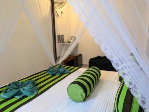 Postel nebo postele na pokoji v ubytování Rich Grove Inn