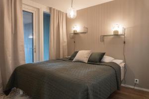 En eller flere senge i et værelse på Holiday Villa Marina D 10