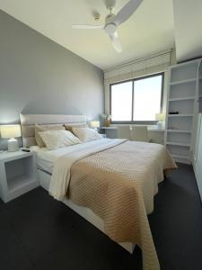 Krevet ili kreveti u jedinici u okviru objekta unixx seaview hotel