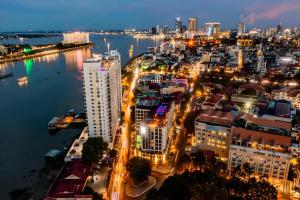 an aerial view of a city at night at X One Hotel in Phnom Penh